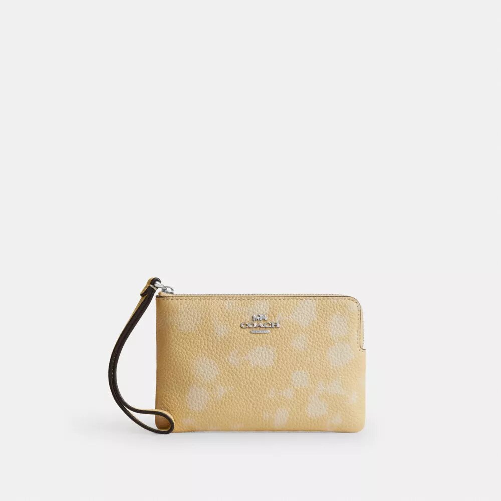 Bolsos de pulsera con cremallera en la esquina y estampado floral