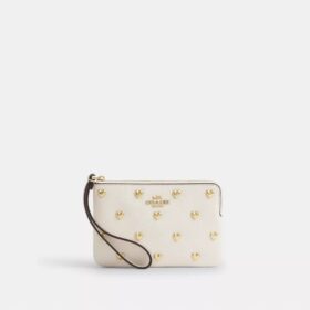 Bolsos de pulsera con cremallera en la esquina y remaches en forma de corazón