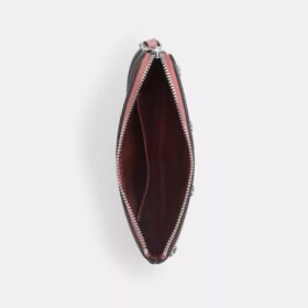 Bolsos de pulsera con cremallera en la esquina y remaches en forma de corazón