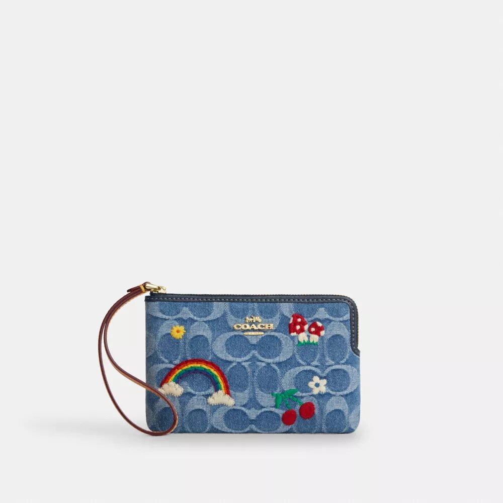 Bolsos de pulsera con cremallera en las esquinas en denim característico