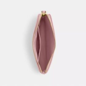 Bolsos de pulsera con cremallera en las esquinas en denim característico