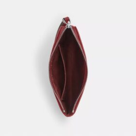 Bolsos de pulsera con cremallera en las esquinas en denim característico