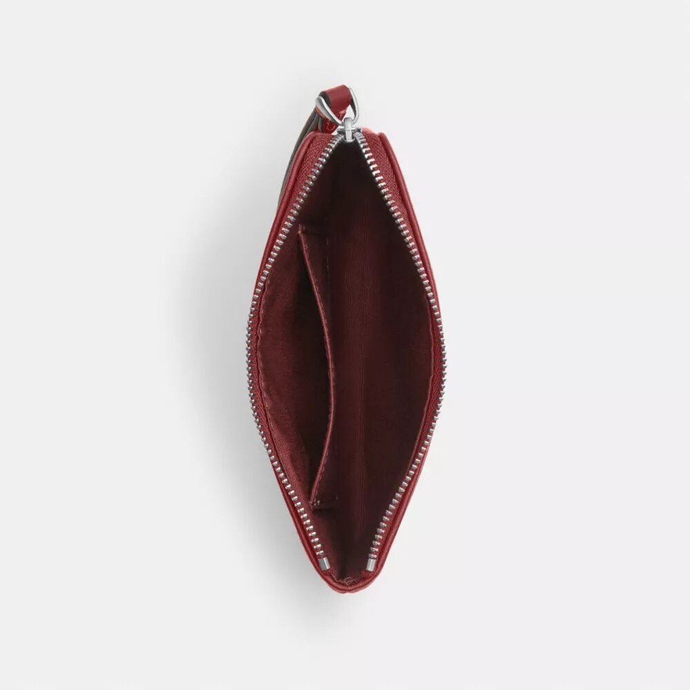 Bolsos de pulsera con cremallera en las esquinas en denim característico