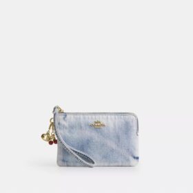 Bolsos de pulsera con cremallera en las esquinas en denim desgastado con Charms