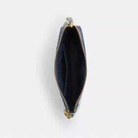 Bolsos de pulsera con cremallera en las esquinas en denim desgastado con Charms