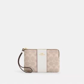 Bolsos de pulsera con cremallera en las esquinas en Signature Canvas con rayas