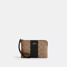 Bolsos de pulsera con cremallera en las esquinas en Signature Canvas con rayas