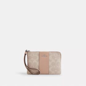 Bolsos de pulsera con cremallera en las esquinas en Signature Canvas con rayas
