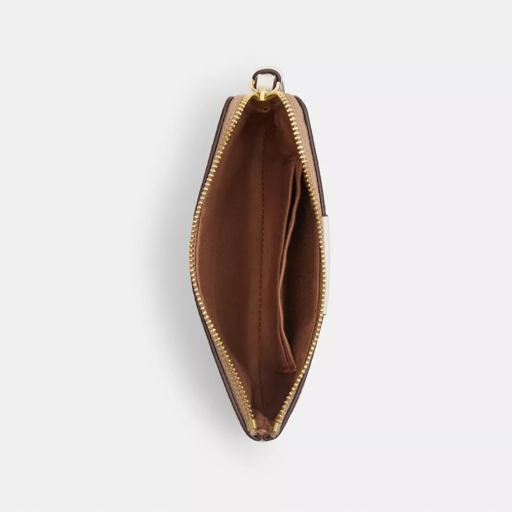 Bolsos de pulsera con cremallera en las esquinas en Signature Canvas con rayas