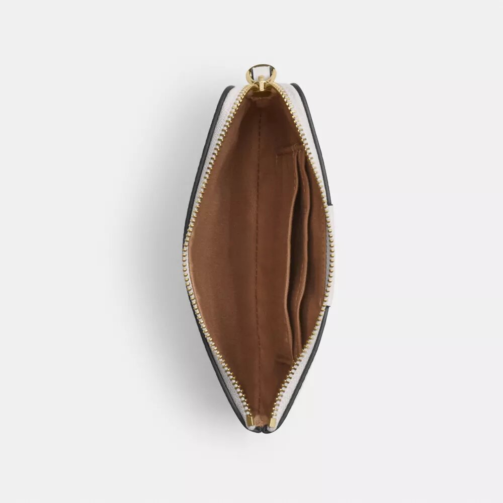 Bolsos de pulsera con cremallera en las esquinas en Signature Canvas con rayas
