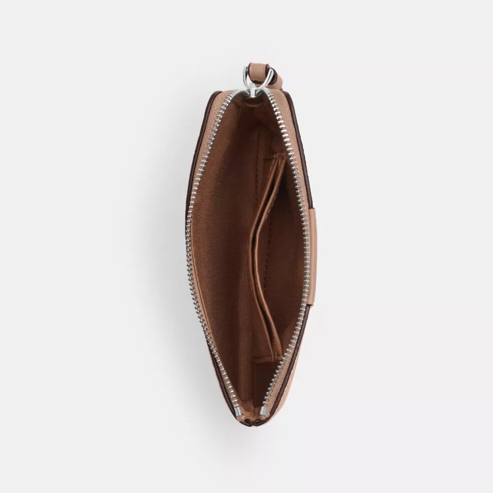 Bolsos de pulsera con cremallera en las esquinas en Signature Canvas con rayas