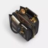 Bolsos Rogue 25 de Disney x Coach con Pluto