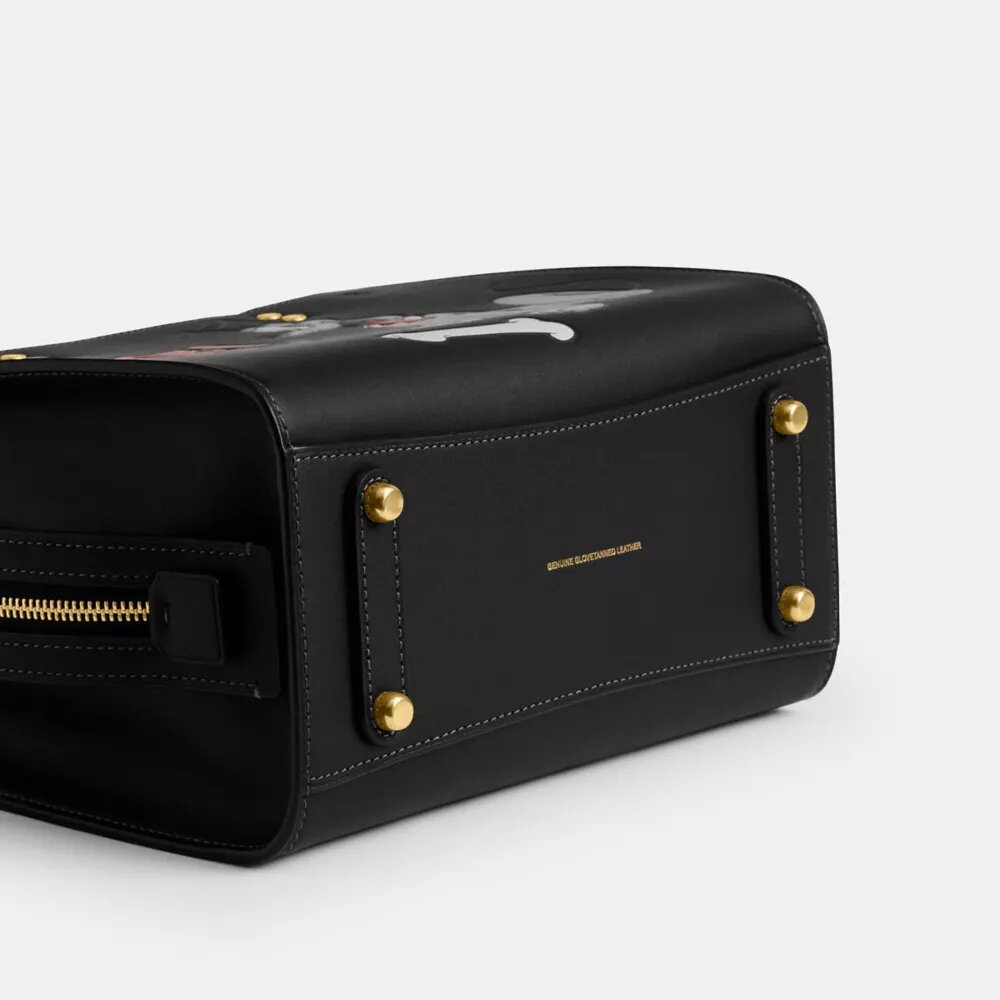Bolsos Rogue 25 de Disney x Coach con Pluto