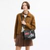 Bolsos Rogue 25 de Disney x Coach con Pluto