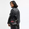 Bolsos Rogue 25 de Disney x Coach con Pluto
