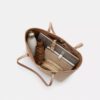 Bolsos Tote City en Signature Canvas