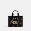 Bolsos Tote Disney X Coach Cargo 26 con Mickey Mouse en lona de algodón regenerativo