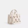Bolsos Tote Disney X Coach Cargo 26 con Mickey Mouse en lona de algodón regenerativo