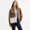 Bolsos Tote Mollie 25 en Signature Canvas