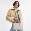 Bolsos Tote Mollie 25 en Signature Canvas