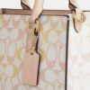 Bolsos Tote pequeño Maggie en Signature Canvas