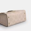 Bolsos Tote pequeños Maggie en Signature Canvas con diseño en bloques