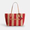 Bolsos Tote urbanos con rayas y dije