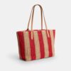 Bolsos Tote urbanos con rayas y dije