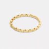 Brazalete con bisagra y cadena emblemática
