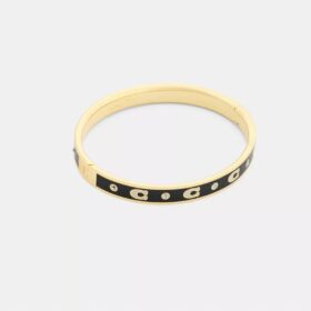 Brazalete con bisagra y letras «C» repetidas