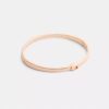 Brazalete delgado con bisagra característico