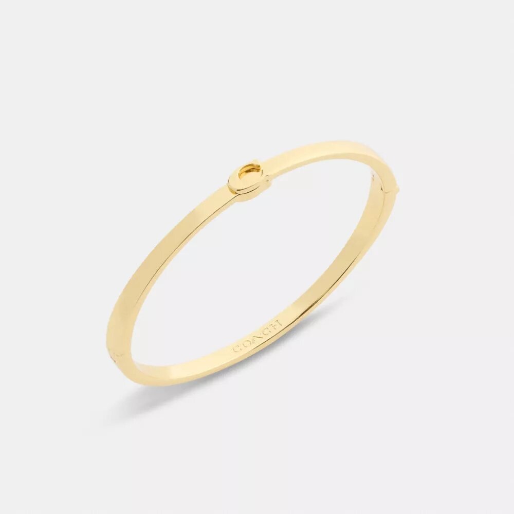 Brazalete delgado con bisagra característico