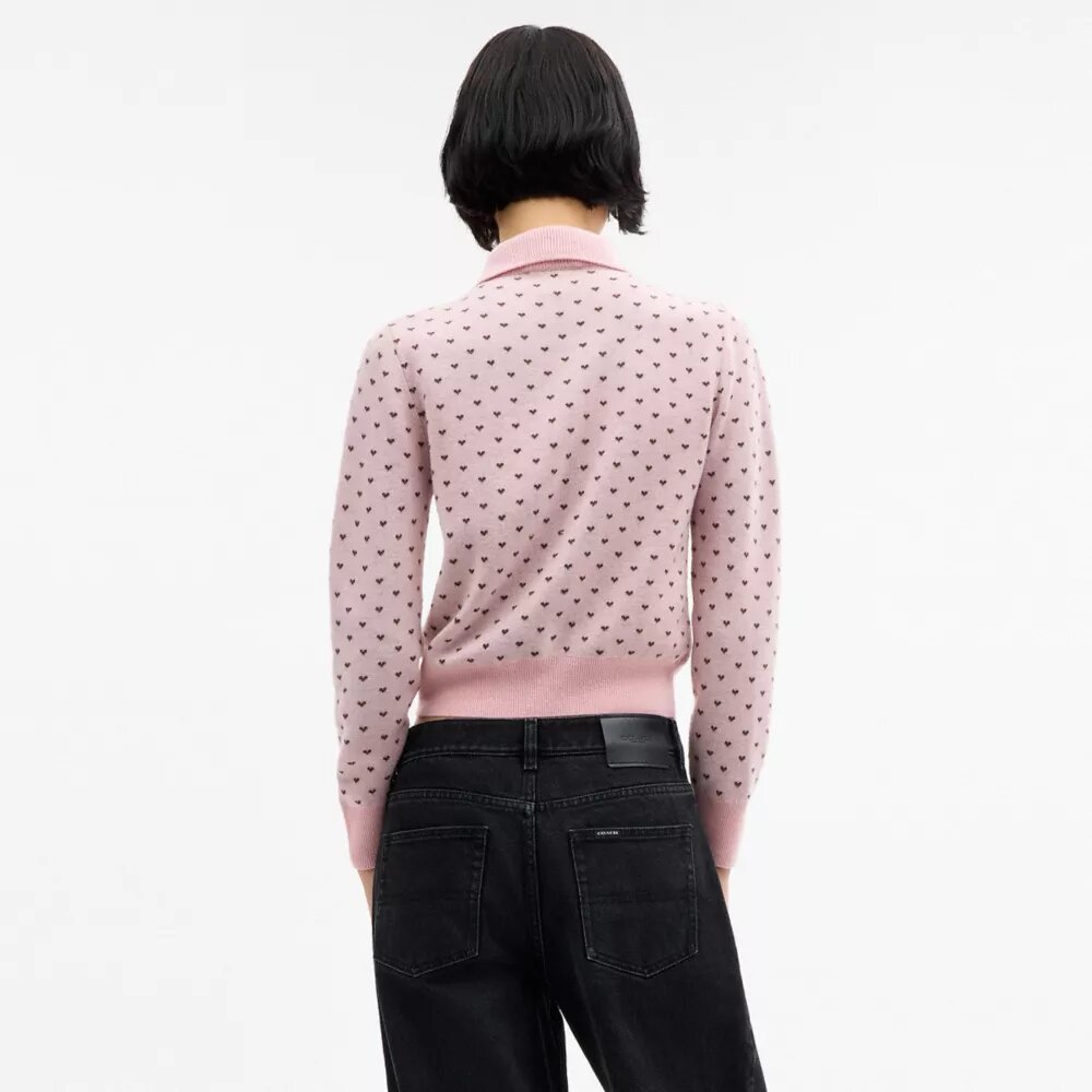Cardigan con corazones en miniatura