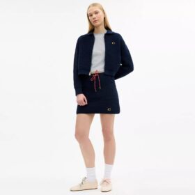 Cardigan con cremallera frontal