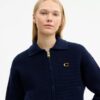 Cardigan con cremallera frontal