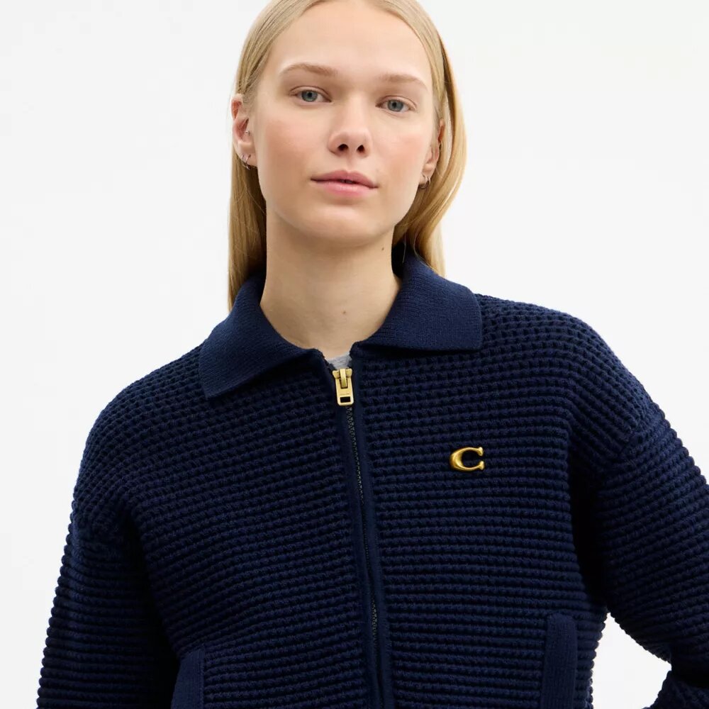 Cardigan con cremallera frontal