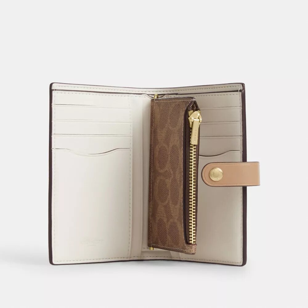 Cartera 2 en 1 en Signature Canvas con diseño a bloques