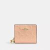 Cartera con broche en cuero exclusivo y Charms