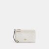 Cartera con doble cremallera en Signature Canvas