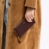 Cartera delgada tipo acordeón con cremallera de Nueva York