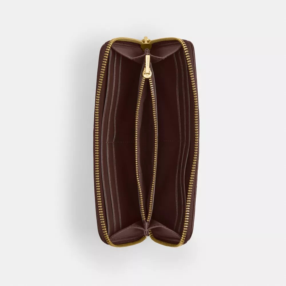 Cartera delgada tipo acordeón con cremallera en jacquard exclusivo