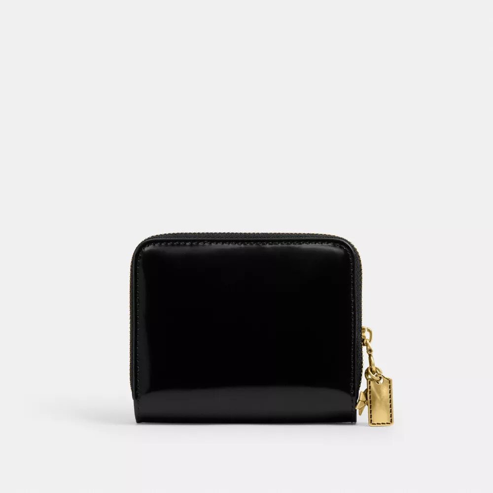 Cartera esencial con Charms