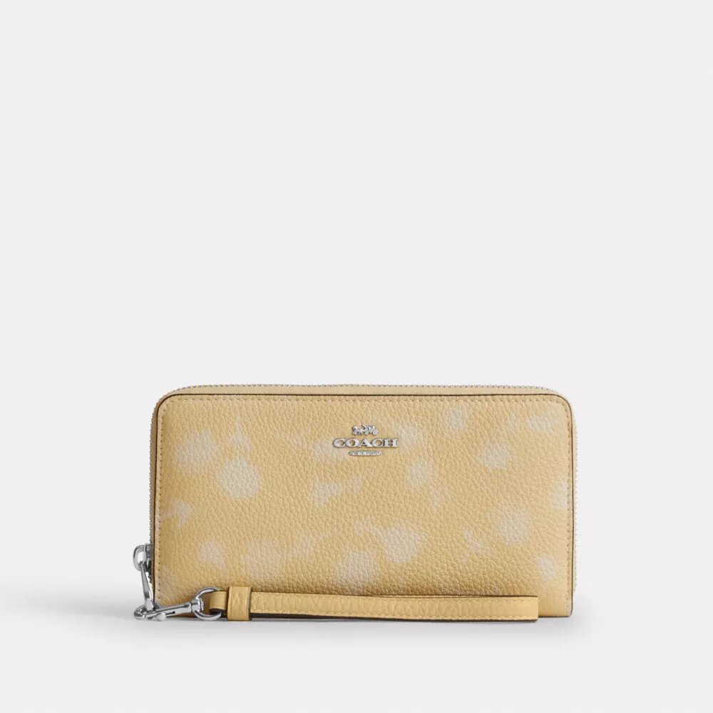 Cartera larga con cierre de cremallera alrededor y estampado floral