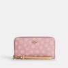 Cartera larga con cierre de cremallera alrededor y estampado floral