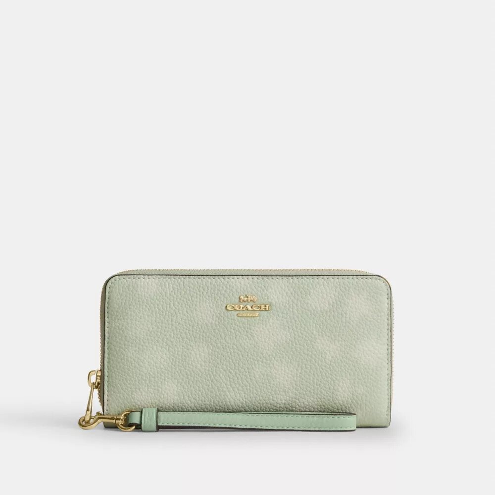 Cartera larga con cierre de cremallera alrededor y estampado floral