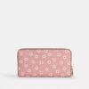 Cartera larga con cierre de cremallera alrededor y estampado floral