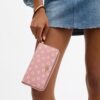 Cartera larga con cierre de cremallera alrededor y estampado floral