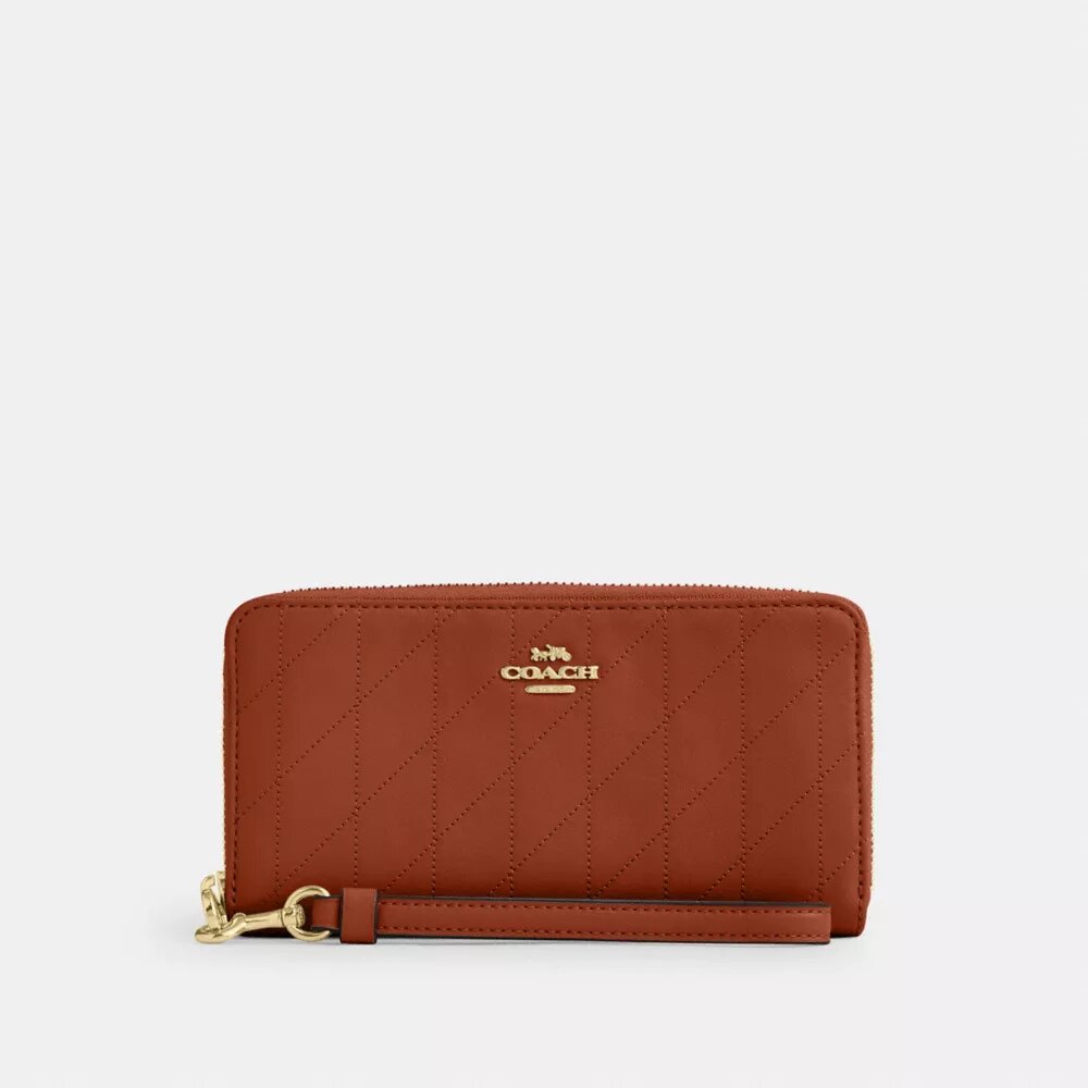 Cartera larga con cremallera alrededor y acolchado
