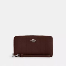 Cartera larga con cremallera alrededor y acolchado