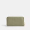 Cartera larga con cremallera alrededor y acolchado